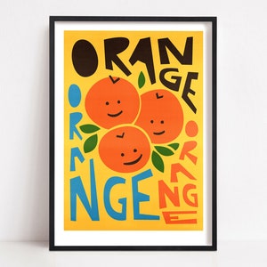 May include: A yellow poster with the word "ORANGE" repeated in a circular pattern. The word is in black, blue, and red letters. Three orange fruit with smiling faces are in the center of the poster.