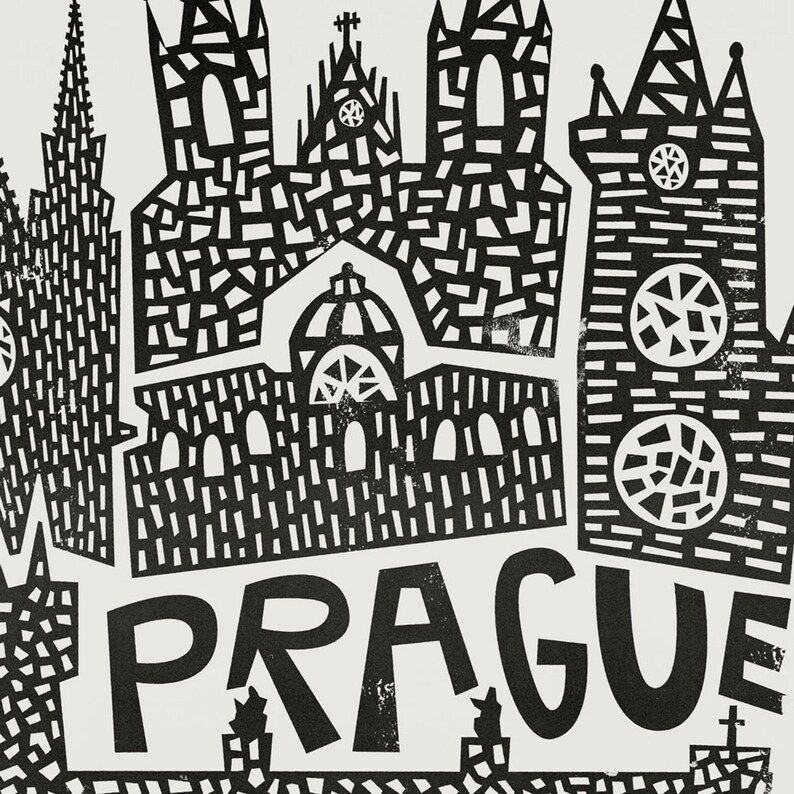 May include: Black and white illustration of the Prague skyline featuring several buildings with intricate geometric patterns. The word "PRAGUE" is written in bold, black letters below the buildings.