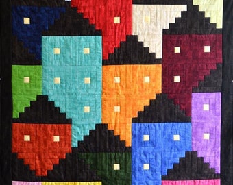 May include: A colourful quilt with a geometric pattern. The quilt is made up of squares and triangles in various colours, including red, orange, yellow, green, blue, purple, and pink. The quilt is bordered in black.