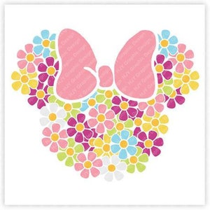 May include: A pink bow with a floral design. The bow is made up of small pink, yellow, green, blue, and white flowers.