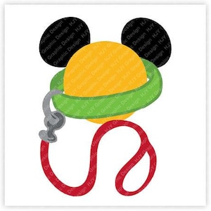 May include: A yellow circle with a green band around it, resembling a dog collar, and two black ears. A red leash is attached to the collar.