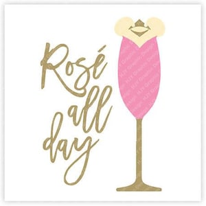 May include: Gold lettering on a white background reads "Rosé all day". A pink champagne glass with a gold crown on top is to the right of the text.