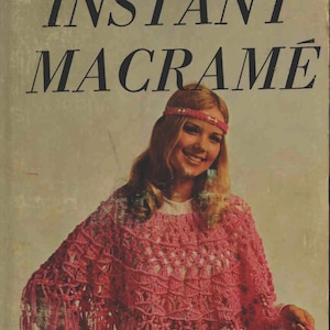 May include: A book cover with the title "INSTANT MACRAMÉ" in bold black letters. A woman with long blonde hair is wearing a pink crocheted poncho with fringe.