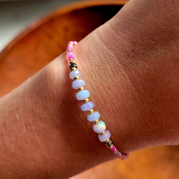 Genuine lavender Ethiopian opal pink beaded bracelet. Firey authentic rondelle opals, precious gemstone, adjustable.