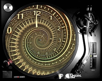 May include: A gold and black turntable slipmat with a spiral design featuring a clock face with Roman numerals. The slipmat is designed to fit a standard 12-inch turntable.