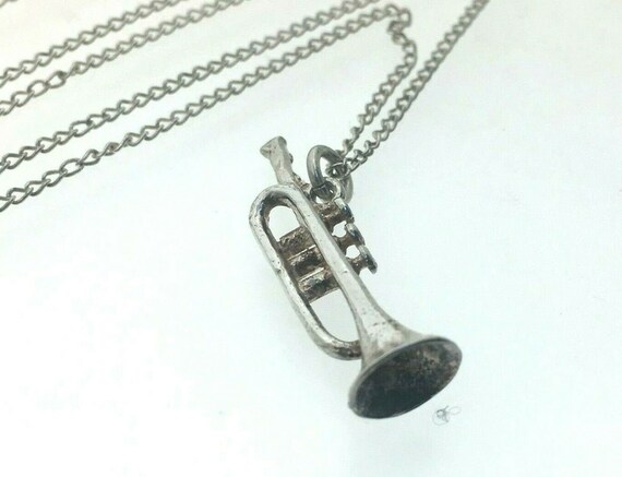 Trumpet charm best sale necklace