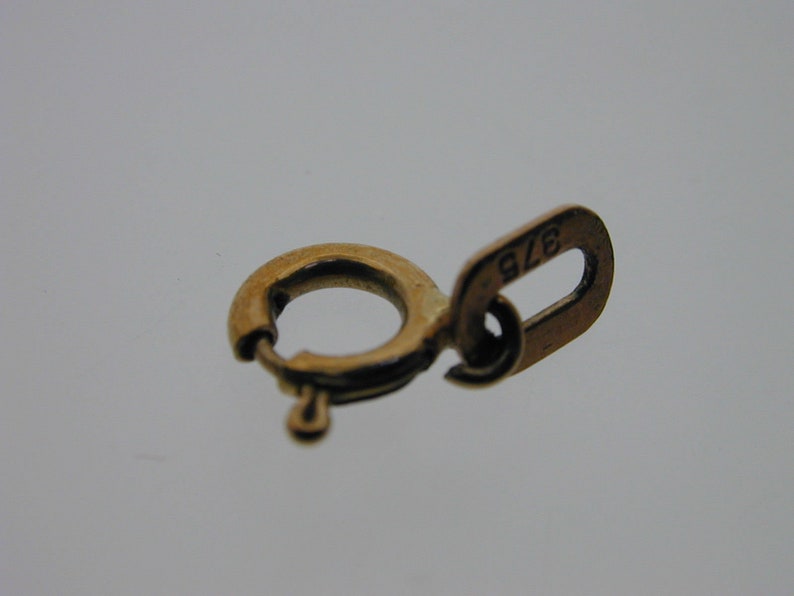 Antique 9 Carat Yellow Gold Bolt Ring with Tag 0.14 grams 4.5 mm