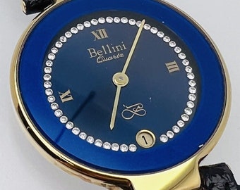 18 Carat Gold Plated Bellini Quartz Watch Blue Face Date Aperture Gemstones