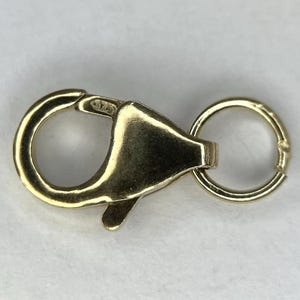 Vintage 9 karat gult guld papegojalås och hoppring 0,8 g 11,9 mm x 6,95 mm