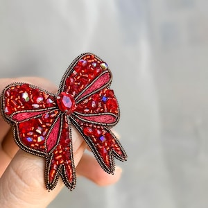 Sparkling Red Crystal Bow Brooch - Handcrafted Elegance!