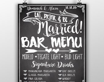 May include: A black chalkboard sign with white text that reads "Dominick & Alicia 12.12.20 Eat, Drink & Be Married! Bar Menu Modelo Tecate Light Bud Light Signature Drinks Mangoneada Margarita Bay Breeze Classic Margarita Sea Breeze Pina Colada Whiskey Tequila Sunrise Micheladas"