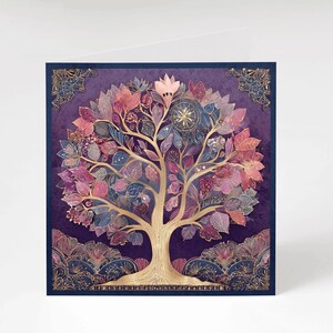 May include: A square art print depicting a stylized tree with a gold trunk and branches. The leaves are a mix of pink, purple, and blue. The background is a deep purple with gold decorative elements.