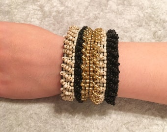 Wood Buckle Bracelet with Beige, Black and Gold Streched Seed Beads.