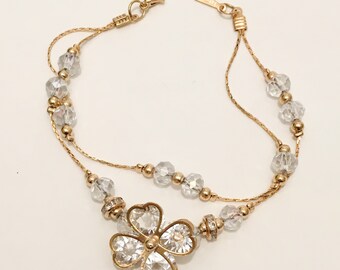 Pulsera de Cristal con Flor Pulsera Bañada en Oro de 18 K.