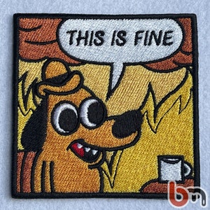 May include: Embroidered patch depicting a cartoon dog in a burning room, holding a coffee cup. The speech bubble reads "THIS IS FINE". The patch has a black border and is square.