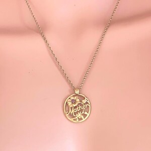 Avon Mother Pendant Necklace with Raw Ruby – Vintage Gold Tone Flower Charm