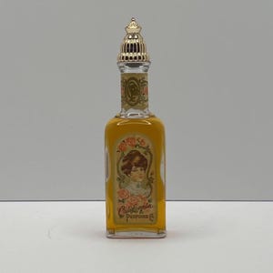 Vintage Avon Perfume Bottle: Ornate Gold Cap & Roses Label