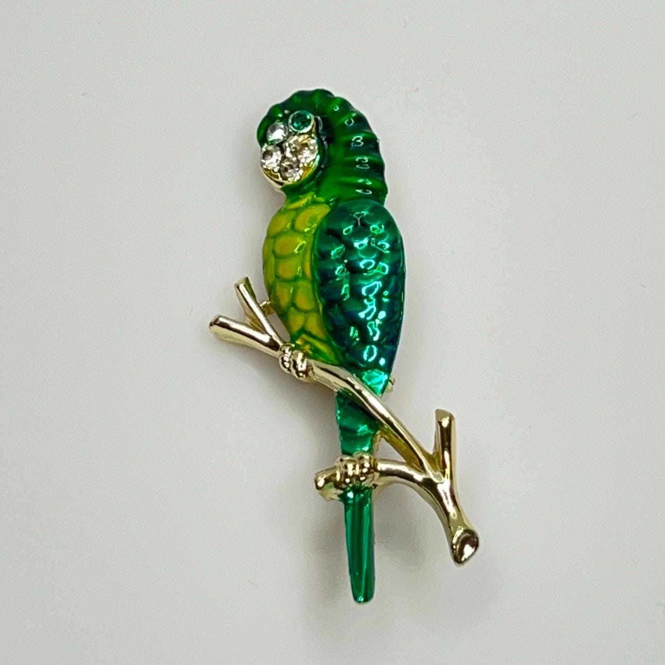 ラインストーンの目が付いたグリーンエナメルのオウムのブローチ