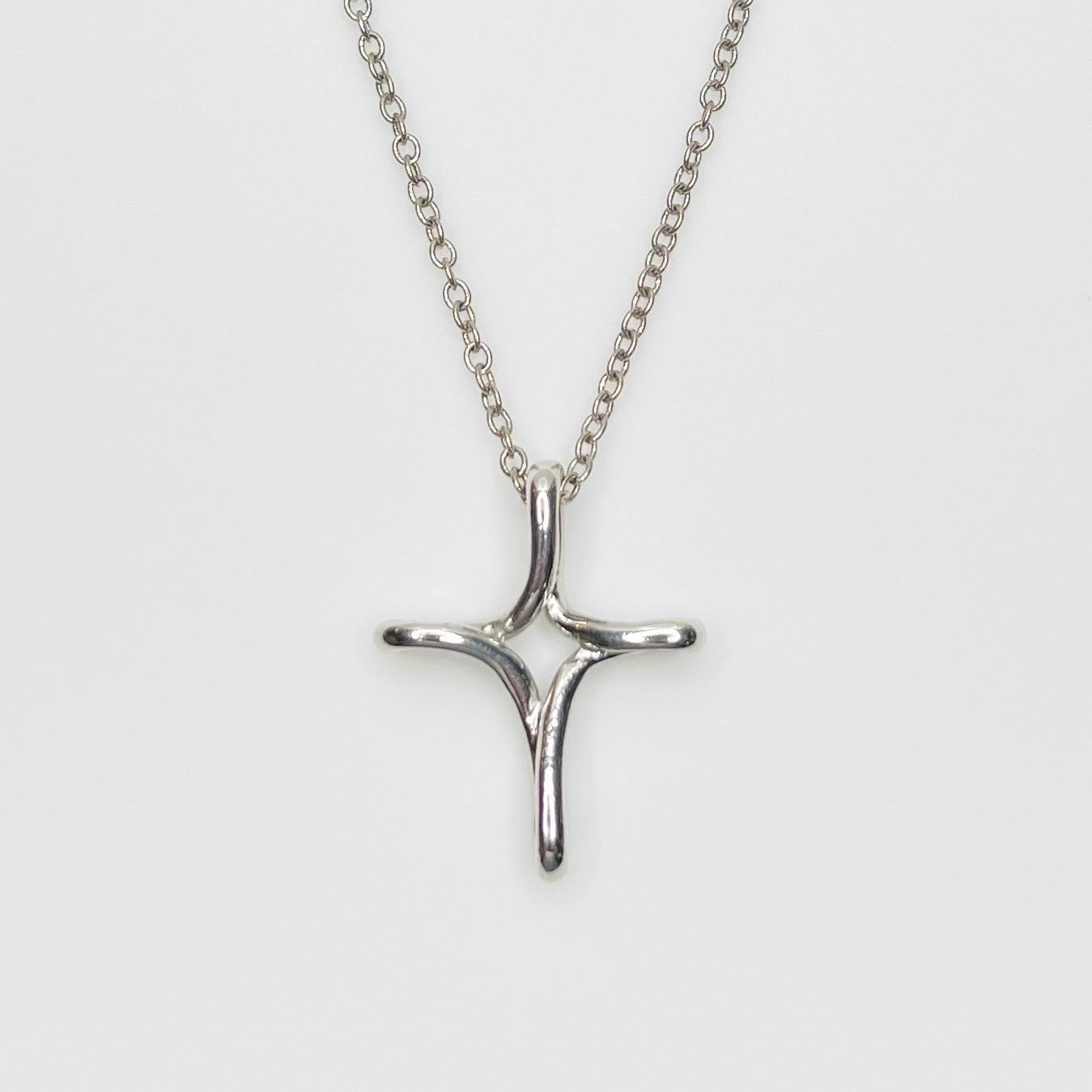 Cookie Lee Abstract Cross Pendant Necklace – Silver Tone Modern