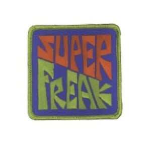 May include: A square-shaped embroidered patch with a purple background and a lime green stitched border. The text SUPER FREAK is displayed in a stylized font, with the word SUPER in orange and the word FREAK in lime green across the center.