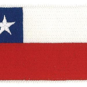 May include: A rectangular embroidered patch featuring the national flag of Chile. The design consists of a white horizontal stripe on top, a red horizontal stripe on the bottom, and a blue square in the upper left corner containing a white star.