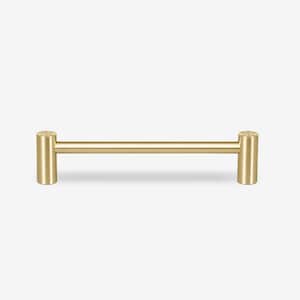 May include: A gold-toned metal cabinet pull with a cylindrical design. The pull is approximately 5 inches long.
