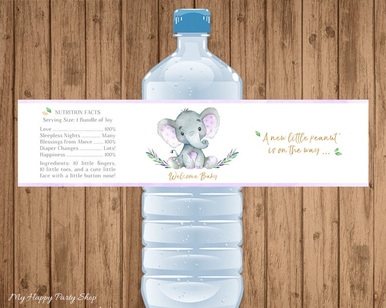 May include: A purple and white baby shower water bottle label with a cute gray elephant illustration and the text "A new little peanut is on the way..." and "Welcome Baby".