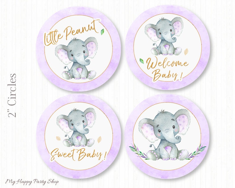 May include: Four 2-inch round purple and white baby shower stickers with a cute gray elephant illustration. The stickers say "Little Peanut", "Welcome Baby!" and "Sweet Baby!"