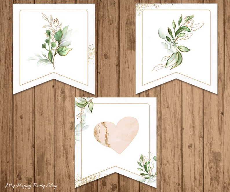 May include: Three printable pennant banners with a gold outline and a white background. Each banner features a watercolour illustration of green leaves and branches. The middle banner also has a pink heart with gold accents.