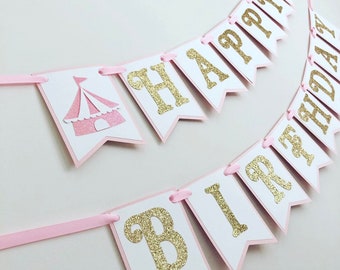 May include: Pink and gold glitter "Happy Birthday" banner with a pink tent graphic.