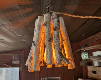 Birch branch swag light for a rustic cabin camp cottage farm barn or man cave