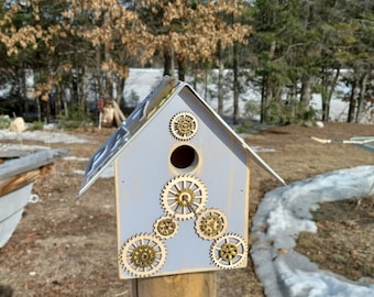 Mississippi license plate roof on a steampunk gear birdhouse drill bit perch