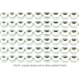 Swarovski 14x10 crystal stones set into a silver plated chain.  Price is for 30 cms