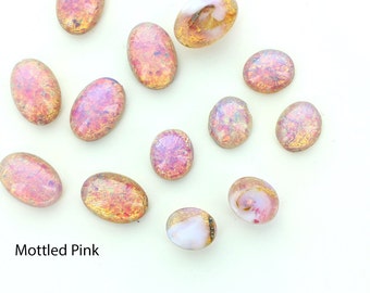 Oval shaped mottled cabochons in sizes 12x10 ,25x18 and 16x11.  Price is for 10 pieces