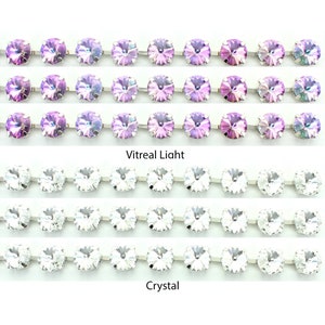 12mm rivolli crystal and colours set in silver plated chain.  Price is for 30cms