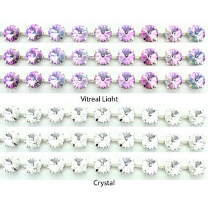 12mm rivoli crystal and colours set in silver plated chain.  Price is for 30cms