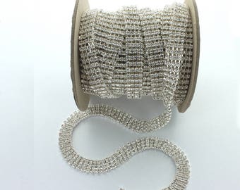 Rhinestone crystal 4 row chain.  Size SS12 4x3mm.  Price is for 1 meter and 30cm