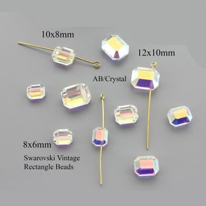 May include: Assortment of iridescent clear glass rectangle beads in various sizes, including 8x6mm, 10x8mm, and 12x10mm. The beads are strung on gold-coloured wire.