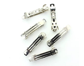 Barrette clips in silver tone.  Price is for 10 clips
