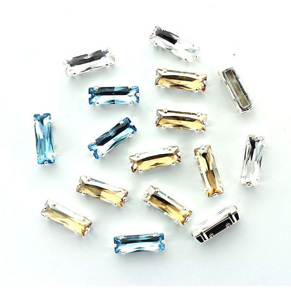 Swarovski 4547 15x5 Princess baguette FS stones in silver plated sew on bezels.  Price is for 1 stone or 5 stones