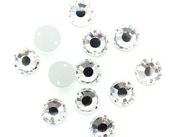 Round flatback crystal 12mm stones with 2 holes for sewing.  Price is for 10 stones