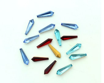 Swarovski 18x5mm vintage stones.  Price is for 10 stones