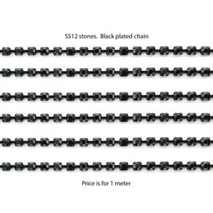 3mm SS12 rhinestone chain.  Jet stones with black plated chain