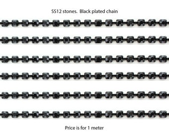 3mm SS12 rhinestone chain.  Jet stones with black plated chain
