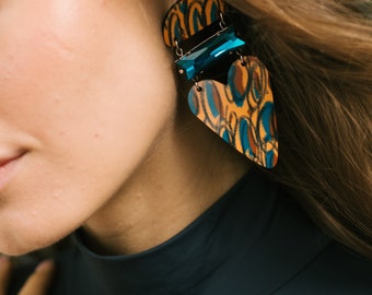 Turquoise Shores: Statement heart-shaped earrings, Asymmetrical handcrafted print; Crystal accents; ONE LEV COLLECTION