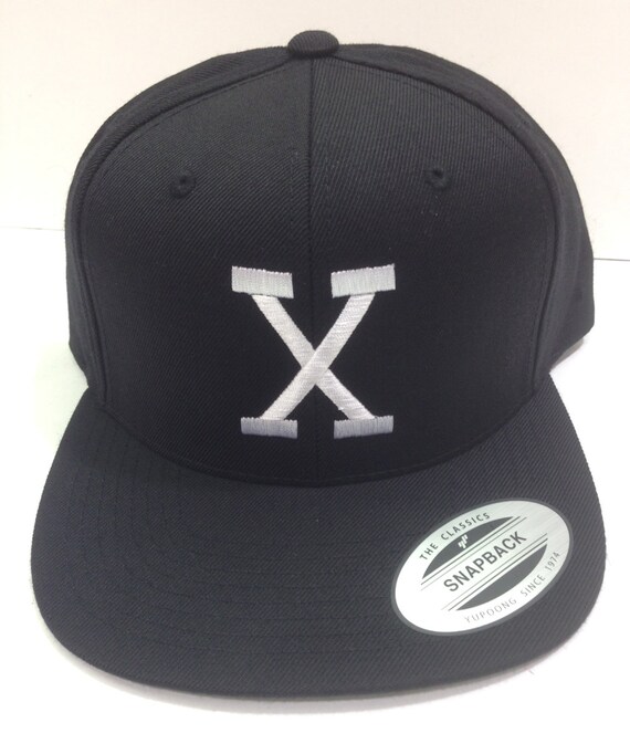 x cap hat