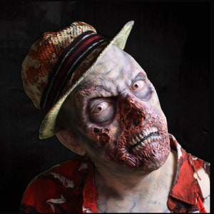 Foam latex zombie prosthetic, unpainted. I can pre-paint for an added fee