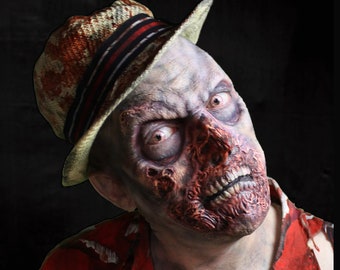 Foam latex zombie prosthetic, unpainted. I can pre-paint for an added fee