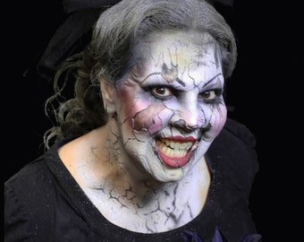 Cracked doll foam latex prosthetic, unpainted. I can paint it for an added fee.