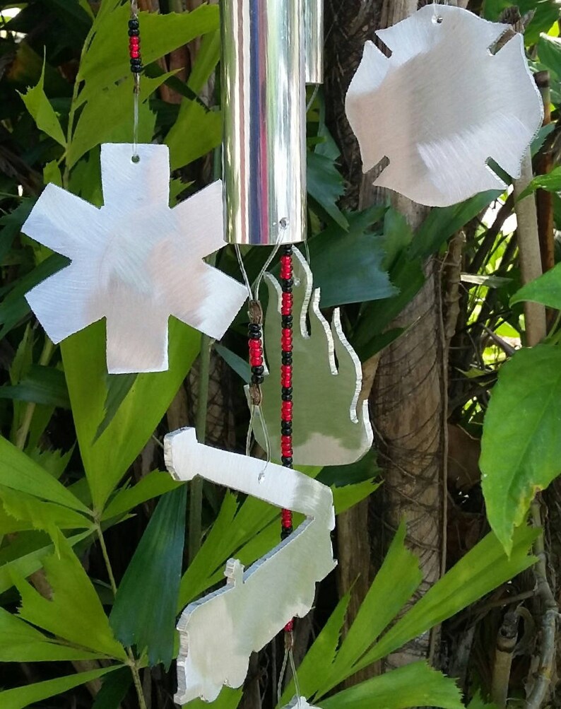 Firemen with fireman wind catcher and glass beads